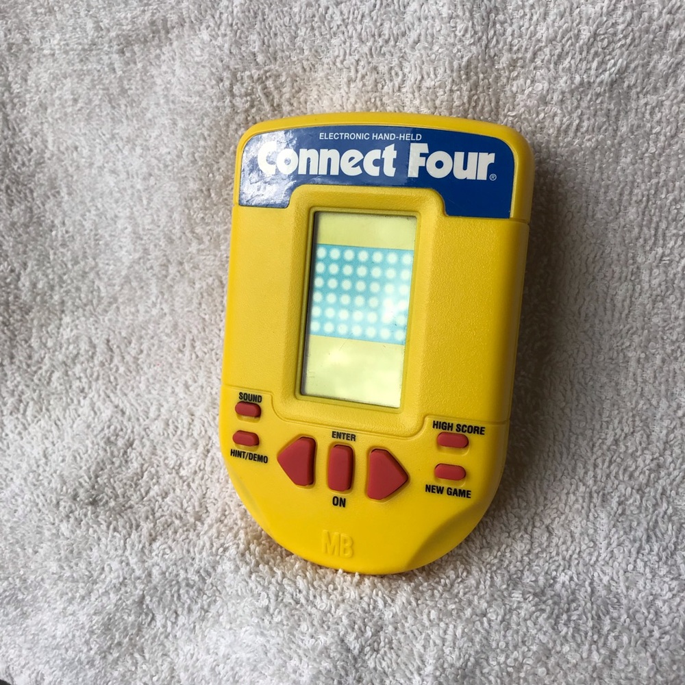 Connect Four hand held electronic game from 1995 by Milton Bradley Comp.